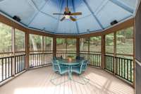 Sellers use the gazebo as a dining space - it was previously used for a hot tub and the plumbing and electrical remain..