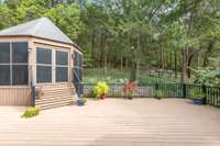 The back porch off the main level is huge and connects to a fully screened gazebo.