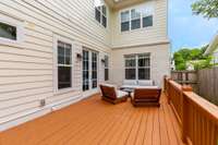 As you walk outside, you have an amazing large deck for hosting parties or drinking your coffee in the morning!