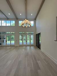 The high ceilings in this Dining Room creates a feeling of spaciousness and elegance. The wine storage is the place to showcase your wind collection. Photo taken 7/14/24