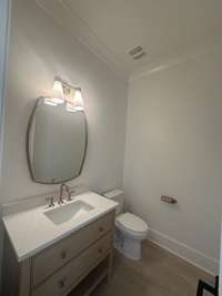 Bonus/Game room Half Bath *this home is under construction photo taken 7/13/24