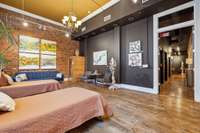 Huge Room with Exposed Brick and transom Window