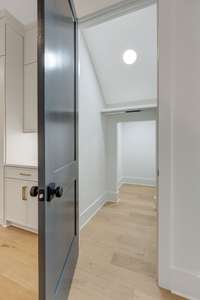 Photos are not actual home but finishes are very similiar. Closet under stairs with storage