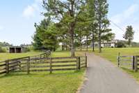 Beautiful 8-acre farm offers a serene and picturesque setting!  Farm is fully fenced, complete with two-stall horse barn, machine shed and acres of pasture for your horses and cattle.