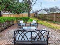 Large backyard space with new (back and side)  8' wood privacy fence.