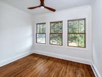 Upstairs back bedroom with sunporch room and jack and jill bath attached