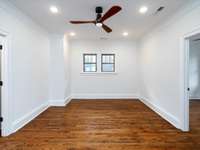 Upstairs back bedroom with sunporch room and jack and jill bath attached