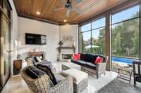 Wood ceiling, screens and poly flooring added to the back patio.