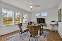 Main level bedroom with full bath and walk-in closet. *Photo is of model home, actual features and finishes may vary.