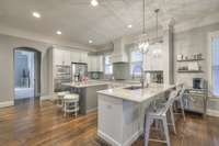 Spacious kitchen with 2 seating areas