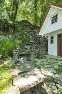 The waterfall filters in lake water and flows back down the rocks into the lake presents a lovely bonus feature.