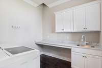 Spacious laundry room with Laundry Chute!