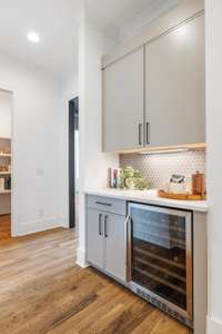 Wine fridge and walk in pantry.