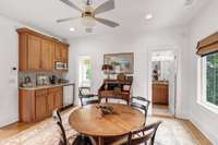 Fourth level game room/bedroom/bonus room with en-suite bath, closet and wet bar with fridge