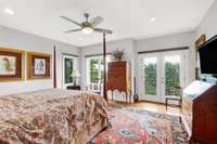 Primary bedroom overlooks the city