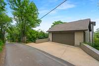 Two car garage is accessed from the rear alley