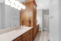 Primary bath has two vanities and two large closets