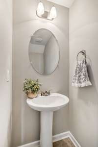 This half bath is located in the living room.