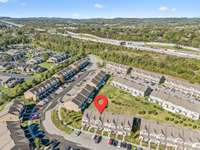 This neighborhood is not very big. As you can see in this drone shot, the community is small and conveniently located to the interstate.