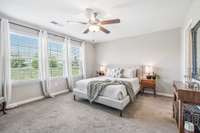 Bedroom number one is the primary bedroom. The windows give you a view of your backyard.