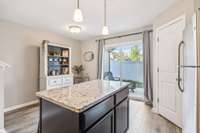 The kitchen opens up to the backyard making it the perfect space for grilling & entertaining.
