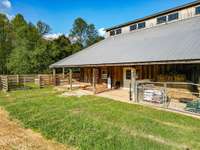 Another side view with sitting area, sandbox and storage area. There is nothing better than a Big Barn to enjoy.