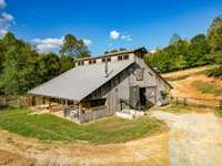 Large Barn with Grain Bin and Fuel Tank