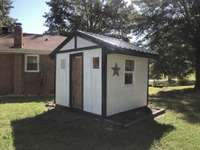 Cute storage building with electricity.