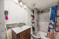 Bathroom with upgraded tile shower