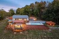 Lots of outside lighting around this outside backyard paradise makes evening and nights on deck even more enjoyable