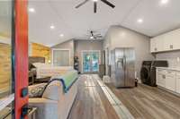 Guest house has solid surface flooring and vaulted ceilings