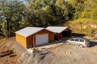 2 workshops that any owner will love, each shop is 600 sq ft, electric in place, concrete floors, cedar siding and metal roof, built in 2023