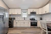 This guest house is fully furnished and could be used as Airbnb rental or mother-in-law