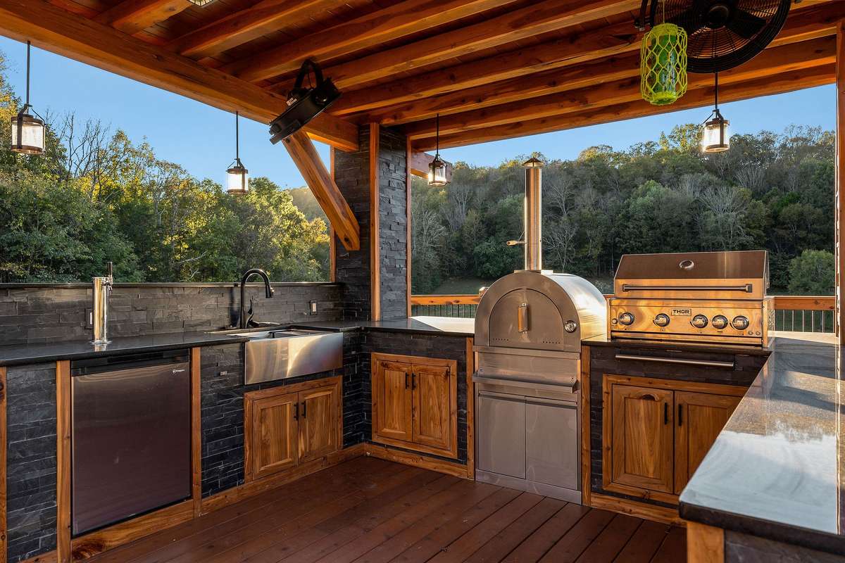 Another view of outdoor kitchen, this one has all the bells and whistles !!