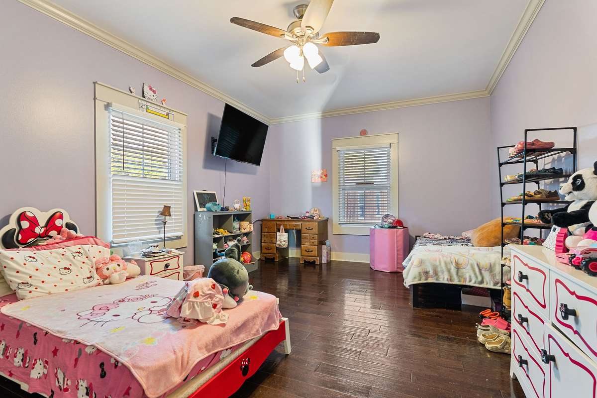 Jack and Jill Bedroom 3 joins full bath, hardwood floors and walk-in closet