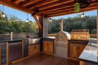 Another view of outdoor kitchen, this one has all the bells and whistles !!