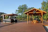 The 24x14 covered shelter is such a cool feature and it includes a 15 foot built in cedar table with attached seating