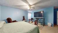 Bedroom 2 features carpeted flooring, a single window, and a ceiling fan.1334 Nicole Ln  La Vergne, TN 37086