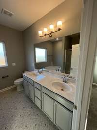 Primary Bath.  *Photo is from a completed unit of the floor plan. Options and selections may vary in actually property.