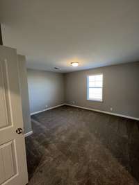 Bedroom #2  *Photo is from a completed unit of the floor plan. Options and selections may vary in actually property.
