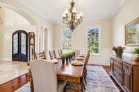 The dining room is further accentuated by elegant wainscoting.