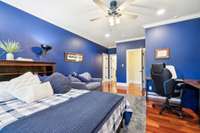 The third bedroom can be found on the upper level and is large enough for a desk and sitting area. Complete with private bath and large walk in closet.