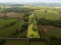 This aerial view outlines the property and offers a bird's-eye perspective and a true sense of it's natural beauty.