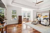 Welcome to your private owners suite. This space is a true retreat. Brazilian hardwood floors warm the space and the tray ceiling adds am architectural element to the space.