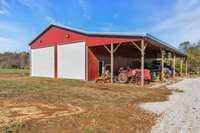 The shop has electricity & automatic garage doors (14x16 &14 x20 size doors), 20x80 side shed, two 220 outlets, wired for a carlift if needed, 6 in. concrete slab, walls and tin roof are insulated, outside is wired for a compressor for future use.