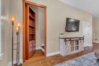 A unique secret bookshelf entry leads to the spacious upstairs. The hidden door adds a touch of intrigue, while the large, upstairs area offers versatile space for relaxation, entertainment, or work, blending functionality with fun!