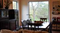 Large windows allowing natural light into the dining area