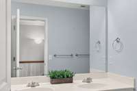 Second floor full bath.  Double vanities.  Tub/shower combo