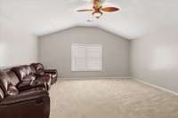 Large bonus room at the top of the stairs.