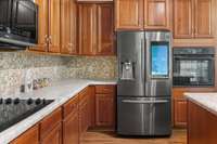 Custom cabinets, tile backsplash